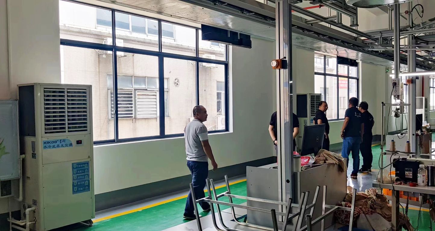 制衣廠廠房降溫工業蒸發省電空調案例.jpg